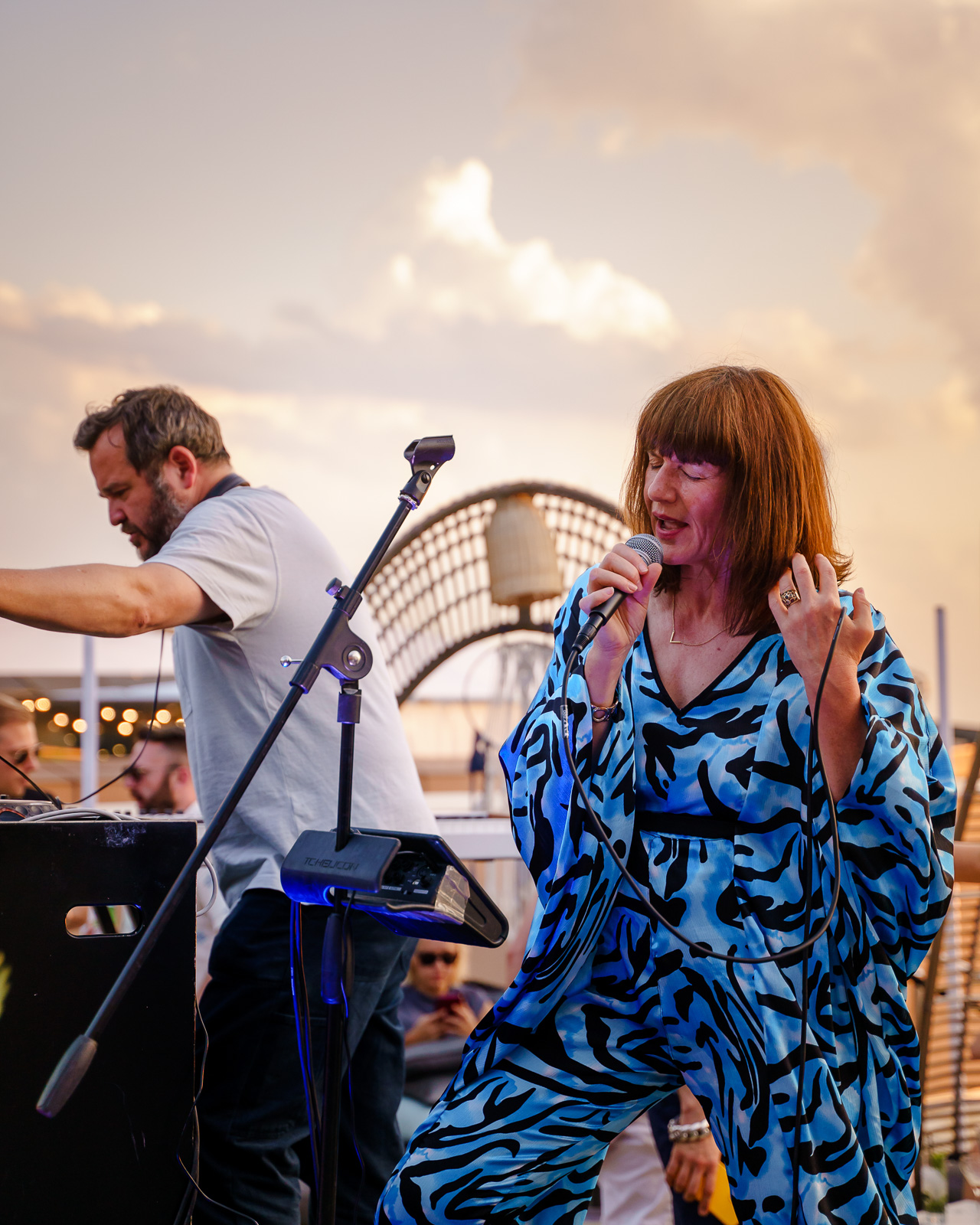 Singer performing live at a London event